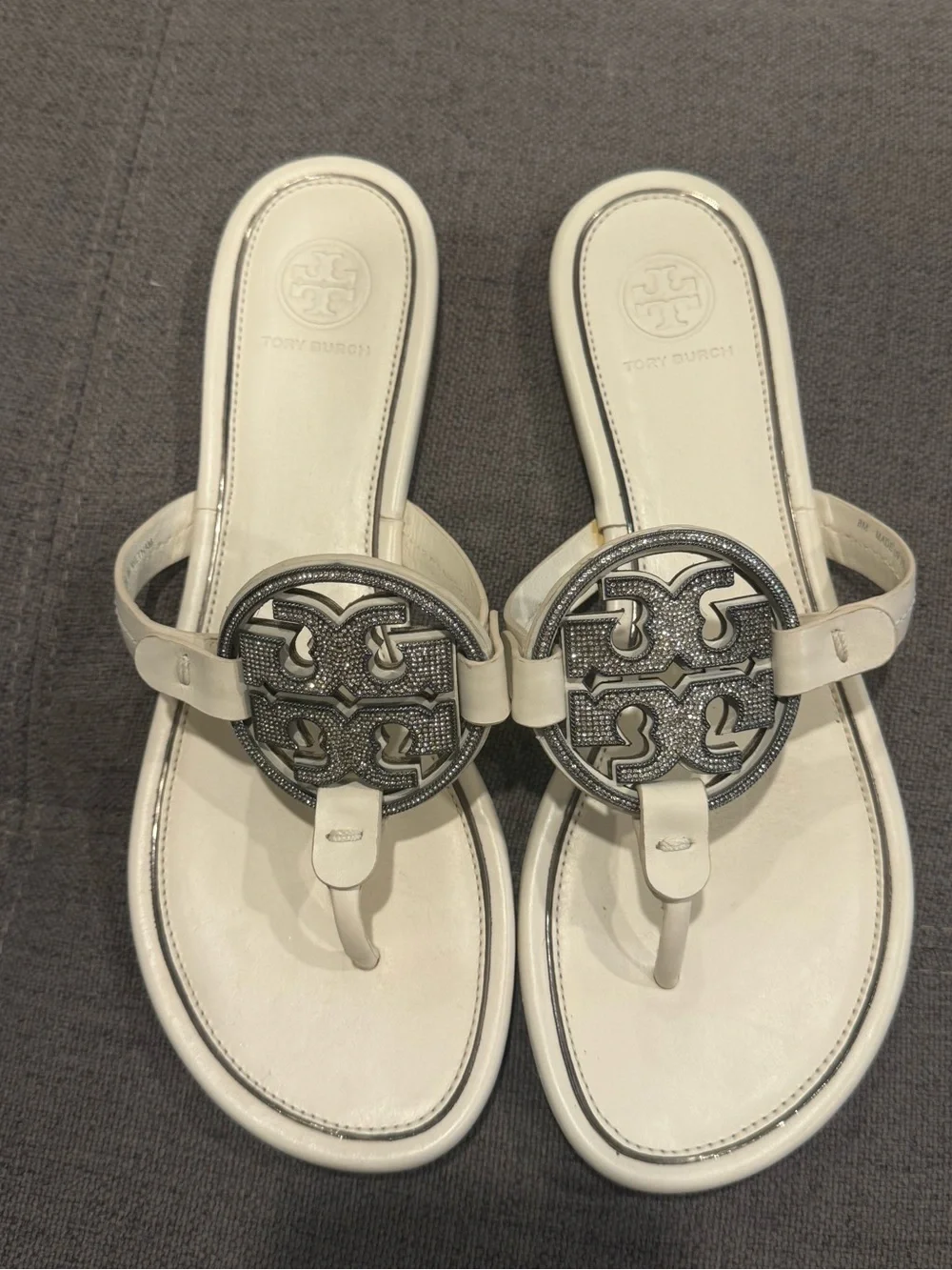 Tory Burch Ivory Leather Logo Thong Sandals with Silver Medallions